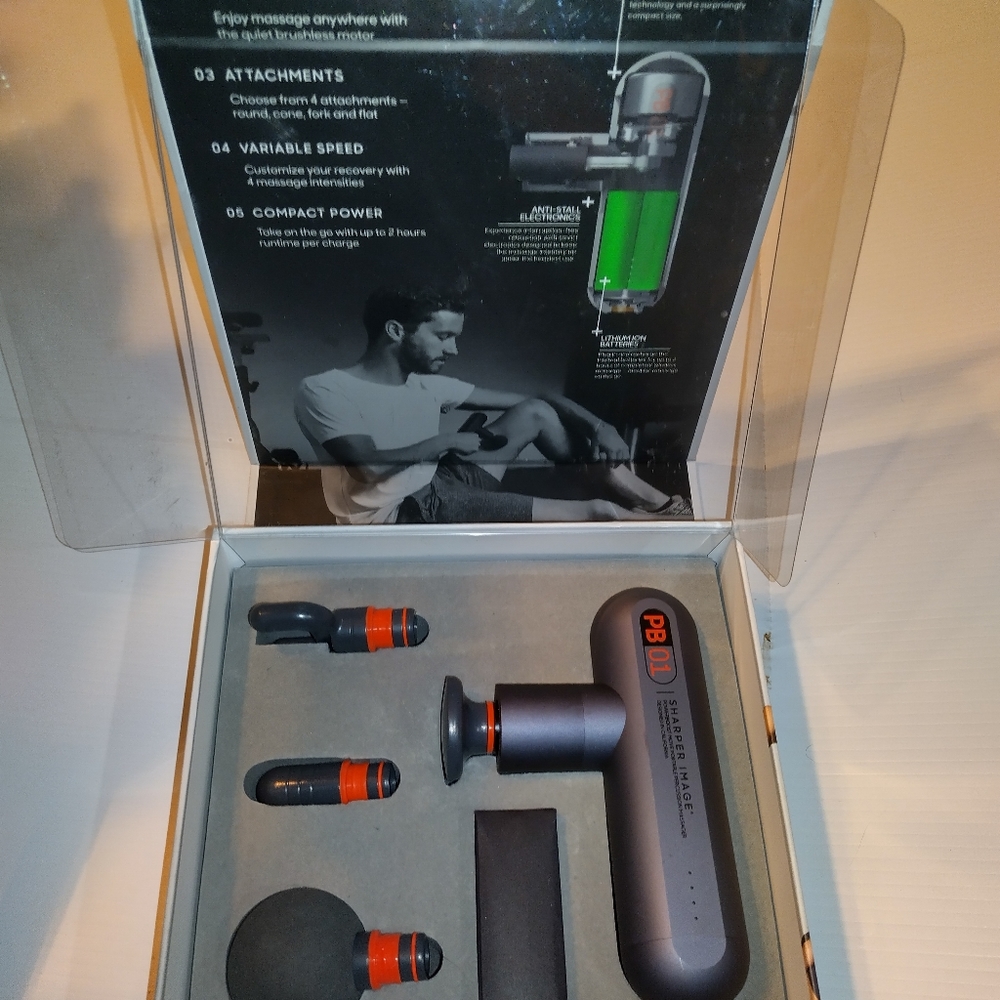 Sharper image . Portable percussion massager.power boost move